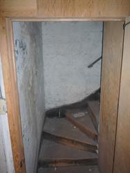 A stairway down from the lobby to the basement rooms in the northeast corner of the building. - , Utah